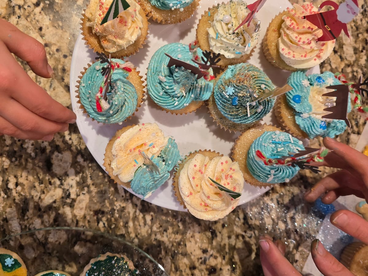 Silky vanilla bean buttercream with dark vanilla bean specks in a mixing bowl, ready for cake decorating
