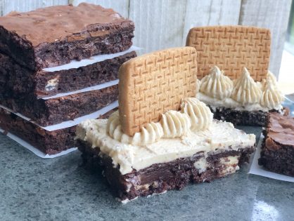 Triple Chocolate Brownies topped with Cookies and Cream Buttercream